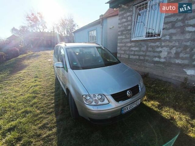 Синий Фольксваген Туран, объемом двигателя 1.4 л и пробегом 233 тыс. км за 5799 $, фото 2 на Automoto.ua