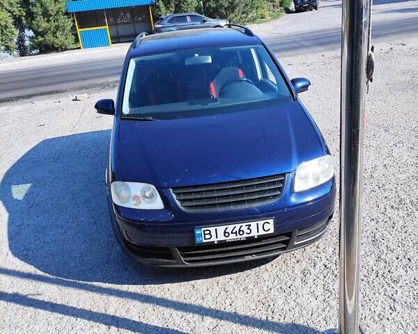 Синий Фольксваген Туран, объемом двигателя 1.39 л и пробегом 241 тыс. км за 6000 $, фото 3 на Automoto.ua