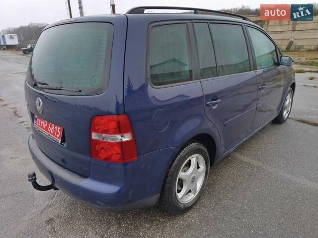 Синий Фольксваген Туран, объемом двигателя 1.6 л и пробегом 227 тыс. км за 5999 $, фото 3 на Automoto.ua