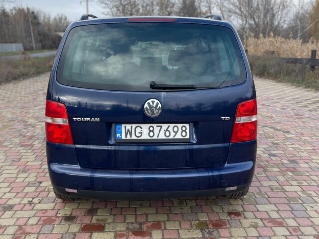 Синий Фольксваген Туран, объемом двигателя 1.9 л и пробегом 322 тыс. км за 3900 $, фото 1 на Automoto.ua