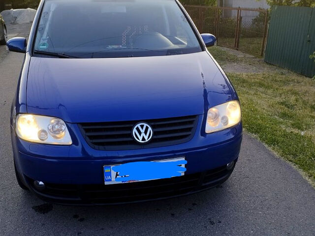 Синій Фольксваген Туран, об'ємом двигуна 1.9 л та пробігом 273 тис. км за 5700 $, фото 1 на Automoto.ua
