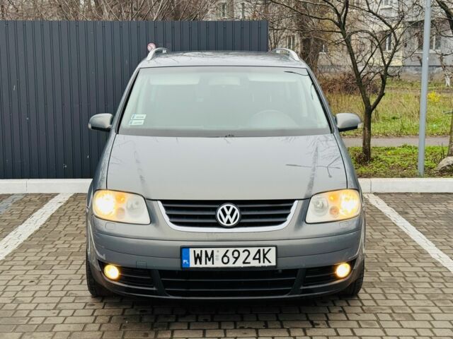 Синий Фольксваген Туран, объемом двигателя 2 л и пробегом 257 тыс. км за 3450 $, фото 6 на Automoto.ua