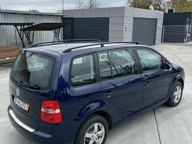 Синий Фольксваген Туран, объемом двигателя 1.6 л и пробегом 247 тыс. км за 7200 $, фото 7 на Automoto.ua