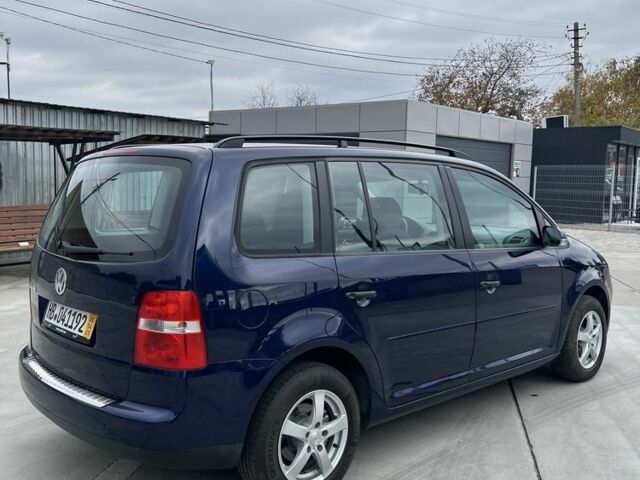 Синий Фольксваген Туран, объемом двигателя 1.6 л и пробегом 247 тыс. км за 7200 $, фото 6 на Automoto.ua