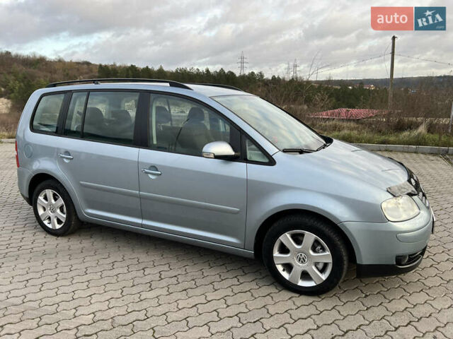 Синій Фольксваген Туран, об'ємом двигуна 1.6 л та пробігом 216 тис. км за 6200 $, фото 28 на Automoto.ua