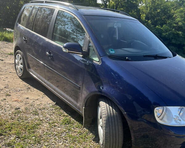 Синій Фольксваген Туран, об'ємом двигуна 1.6 л та пробігом 210 тис. км за 5700 $, фото 4 на Automoto.ua