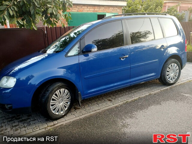 Синій Фольксваген Туран, об'ємом двигуна 1.9 л та пробігом 273 тис. км за 5700 $, фото 10 на Automoto.ua