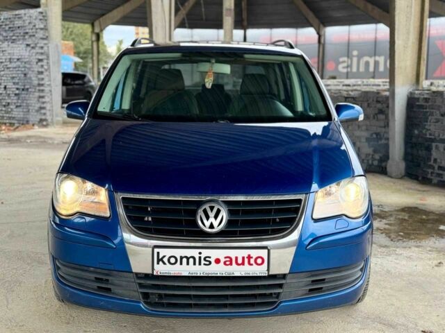 Синий Фольксваген Туран, объемом двигателя 1.4 л и пробегом 241 тыс. км за 6399 $, фото 4 на Automoto.ua