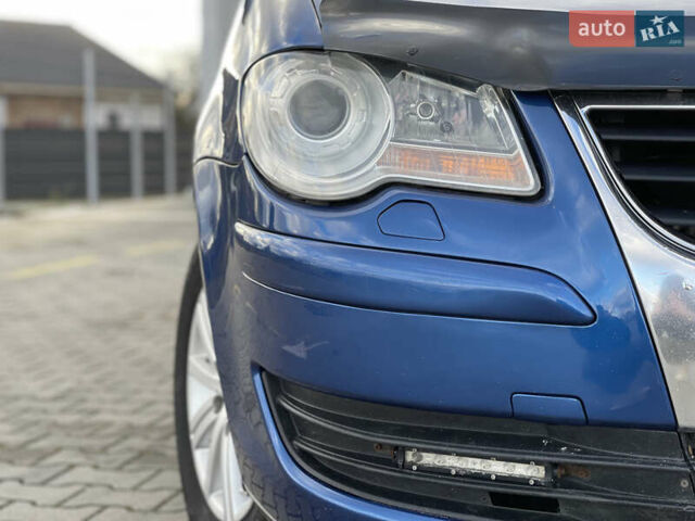 Синий Фольксваген Туран, объемом двигателя 1.6 л и пробегом 268 тыс. км за 6399 $, фото 13 на Automoto.ua