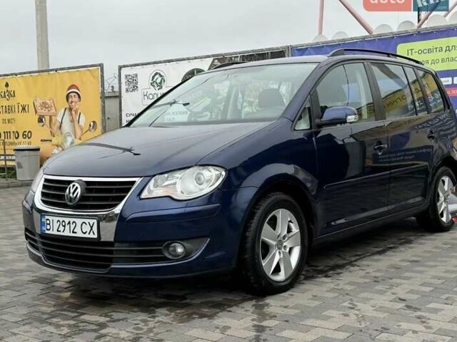 Синий Фольксваген Туран, объемом двигателя 1.4 л и пробегом 203 тыс. км за 6700 $, фото 1 на Automoto.ua