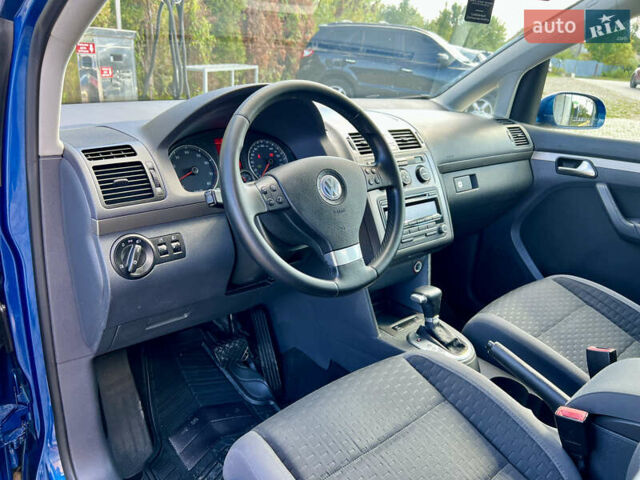 Синий Фольксваген Туран, объемом двигателя 1.4 л и пробегом 260 тыс. км за 6750 $, фото 37 на Automoto.ua