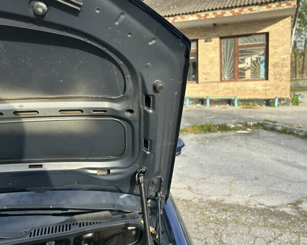 Синий Фольксваген Туран, объемом двигателя 1.4 л и пробегом 237 тыс. км за 6000 $, фото 35 на Automoto.ua