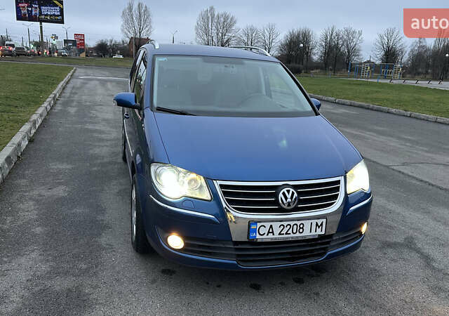 Синій Фольксваген Туран, об'ємом двигуна 1.4 л та пробігом 223 тис. км за 6999 $, фото 1 на Automoto.ua