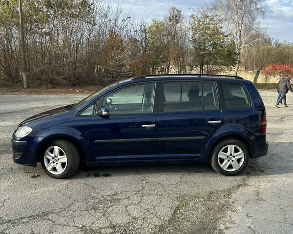 Синий Фольксваген Туран, объемом двигателя 1.4 л и пробегом 237 тыс. км за 6000 $, фото 4 на Automoto.ua