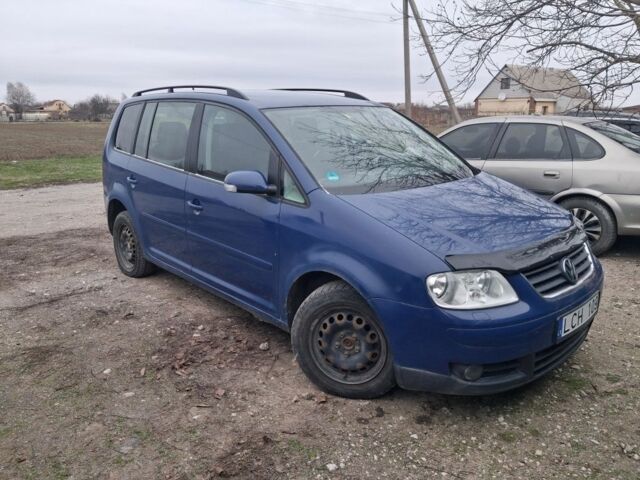 Синий Фольксваген Туран, объемом двигателя 2 л и пробегом 200 тыс. км за 2200 $, фото 1 на Automoto.ua