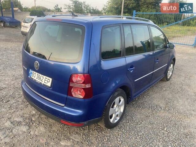 Синий Фольксваген Туран, объемом двигателя 1.9 л и пробегом 292 тыс. км за 8000 $, фото 4 на Automoto.ua