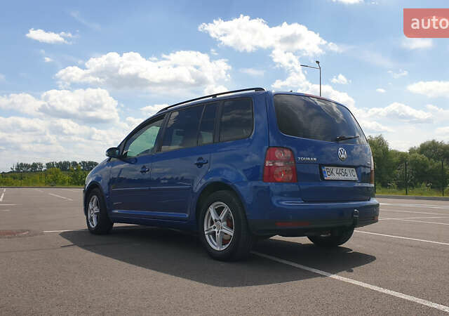 Синій Фольксваген Туран, об'ємом двигуна 1.4 л та пробігом 280 тис. км за 5888 $, фото 11 на Automoto.ua