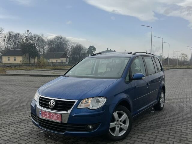 Синій Фольксваген Туран, об'ємом двигуна 1.4 л та пробігом 208 тис. км за 6899 $, фото 1 на Automoto.ua