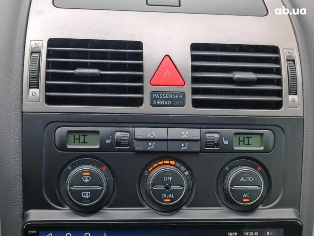 Синій Фольксваген Туран, об'ємом двигуна 1.4 л та пробігом 224 тис. км за 6490 $, фото 27 на Automoto.ua