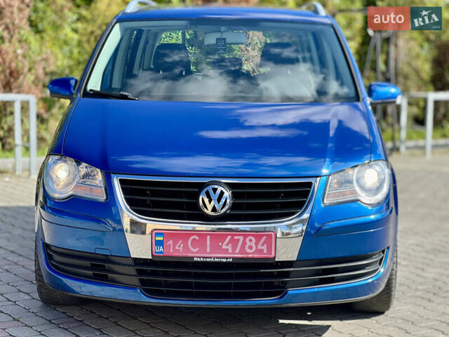 Синий Фольксваген Туран, объемом двигателя 1.4 л и пробегом 260 тыс. км за 6750 $, фото 7 на Automoto.ua