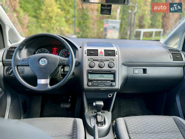 Синий Фольксваген Туран, объемом двигателя 1.4 л и пробегом 260 тыс. км за 6750 $, фото 57 на Automoto.ua