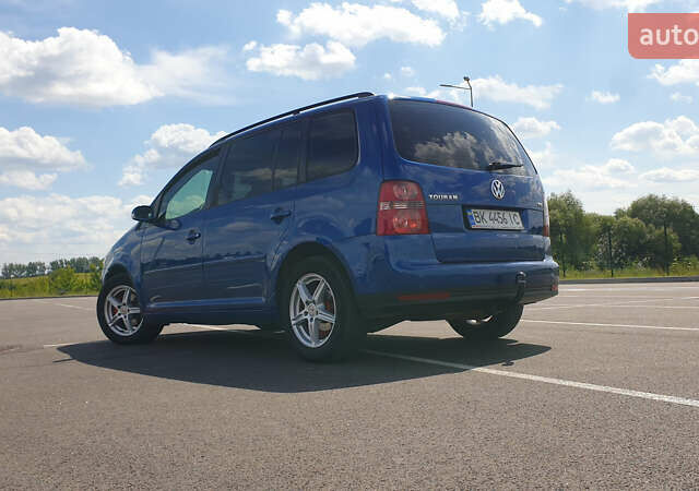 Синій Фольксваген Туран, об'ємом двигуна 1.4 л та пробігом 280 тис. км за 5888 $, фото 16 на Automoto.ua