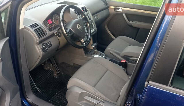Синий Фольксваген Туран, объемом двигателя 1.4 л и пробегом 237 тыс. км за 6000 $, фото 50 на Automoto.ua