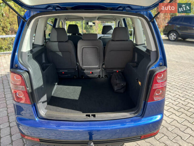 Синий Фольксваген Туран, объемом двигателя 1.4 л и пробегом 260 тыс. км за 6750 $, фото 59 на Automoto.ua