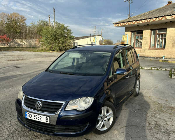 Синий Фольксваген Туран, объемом двигателя 1.4 л и пробегом 237 тыс. км за 6000 $, фото 2 на Automoto.ua