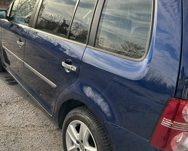 Синий Фольксваген Туран, объемом двигателя 1.4 л и пробегом 237 тыс. км за 6000 $, фото 25 на Automoto.ua