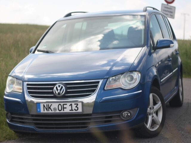 Синий Фольксваген Туран, объемом двигателя 1.9 л и пробегом 381 тыс. км за 2328 $, фото 3 на Automoto.ua