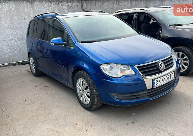 Синій Фольксваген Туран, об'ємом двигуна 1.4 л та пробігом 280 тис. км за 5888 $, фото 17 на Automoto.ua