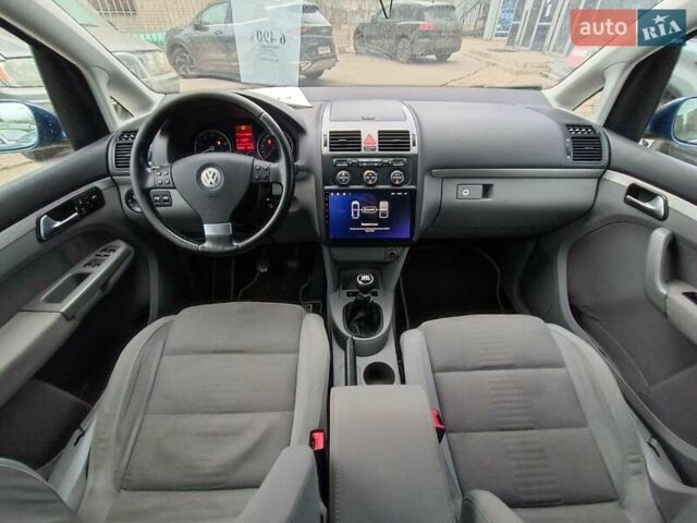 Синий Фольксваген Туран, объемом двигателя 1.4 л и пробегом 224 тыс. км за 6490 $, фото 15 на Automoto.ua
