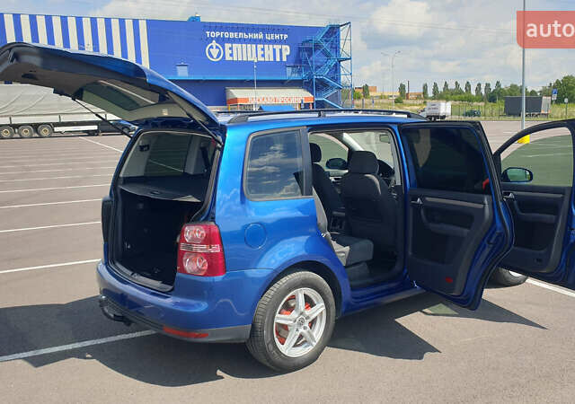 Синій Фольксваген Туран, об'ємом двигуна 1.4 л та пробігом 280 тис. км за 5888 $, фото 4 на Automoto.ua