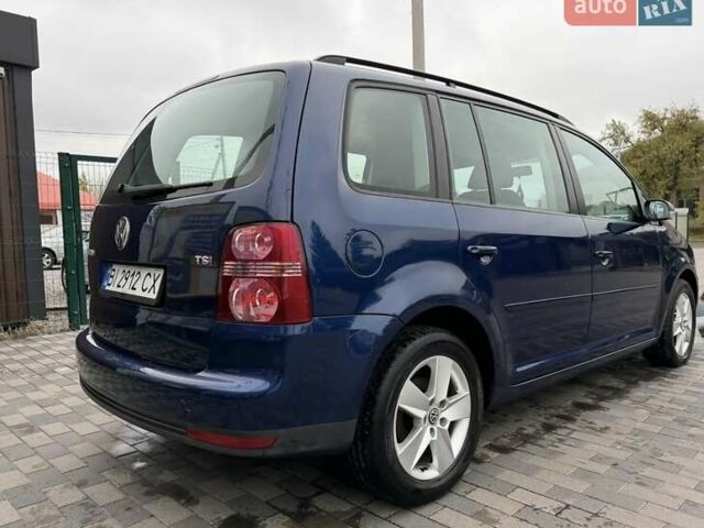 Синий Фольксваген Туран, объемом двигателя 1.4 л и пробегом 203 тыс. км за 6700 $, фото 4 на Automoto.ua
