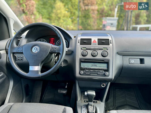 Синий Фольксваген Туран, объемом двигателя 1.4 л и пробегом 260 тыс. км за 6750 $, фото 56 на Automoto.ua