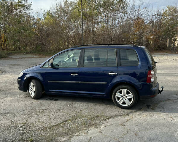 Синий Фольксваген Туран, объемом двигателя 1.4 л и пробегом 237 тыс. км за 6000 $, фото 5 на Automoto.ua