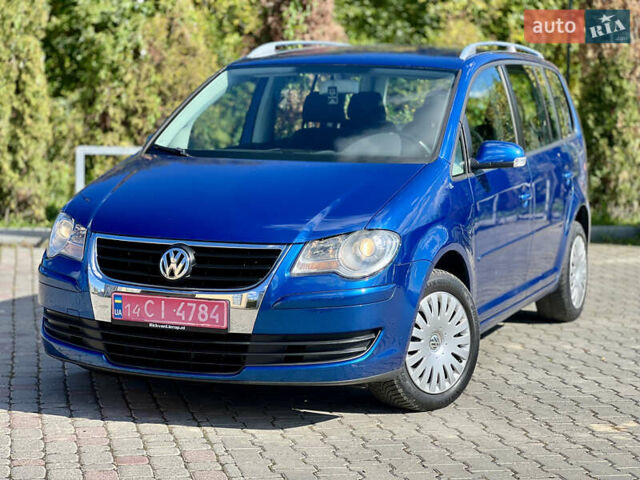 Синий Фольксваген Туран, объемом двигателя 1.4 л и пробегом 260 тыс. км за 6750 $, фото 1 на Automoto.ua