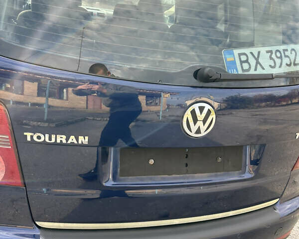 Синий Фольксваген Туран, объемом двигателя 1.4 л и пробегом 237 тыс. км за 6000 $, фото 23 на Automoto.ua