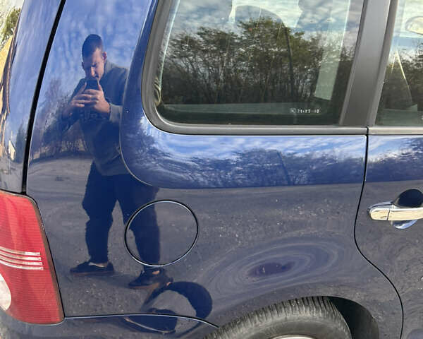 Синий Фольксваген Туран, объемом двигателя 1.4 л и пробегом 237 тыс. км за 6000 $, фото 20 на Automoto.ua