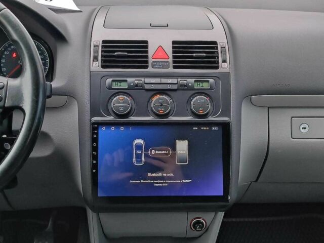 Синий Фольксваген Туран, объемом двигателя 1.4 л и пробегом 224 тыс. км за 6490 $, фото 17 на Automoto.ua