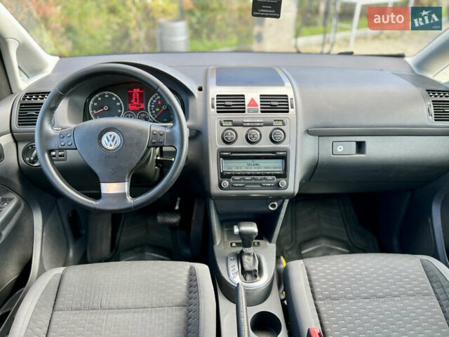 Синий Фольксваген Туран, объемом двигателя 1.4 л и пробегом 260 тыс. км за 6750 $, фото 54 на Automoto.ua