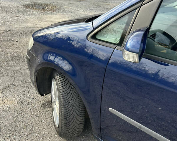 Синий Фольксваген Туран, объемом двигателя 1.4 л и пробегом 237 тыс. км за 6000 $, фото 28 на Automoto.ua