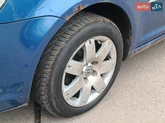 Синий Фольксваген Туран, объемом двигателя 1.4 л и пробегом 224 тыс. км за 6490 $, фото 5 на Automoto.ua