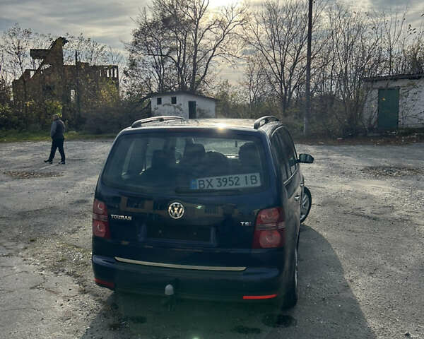Синий Фольксваген Туран, объемом двигателя 1.4 л и пробегом 237 тыс. км за 6000 $, фото 11 на Automoto.ua