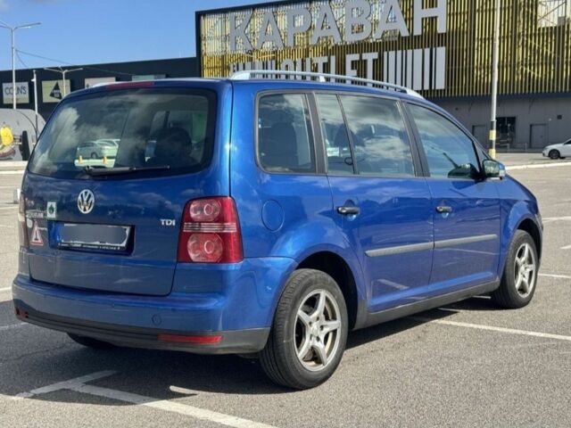 Синий Фольксваген Туран, объемом двигателя 1.9 л и пробегом 230 тыс. км за 4500 $, фото 2 на Automoto.ua