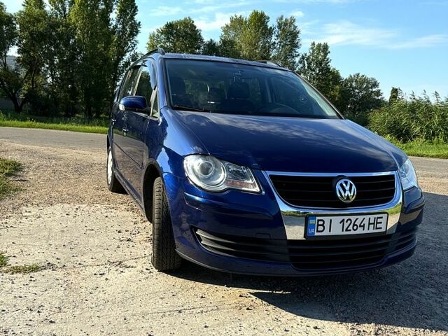 Синій Фольксваген Туран, об'ємом двигуна 1.4 л та пробігом 220 тис. км за 5900 $, фото 1 на Automoto.ua