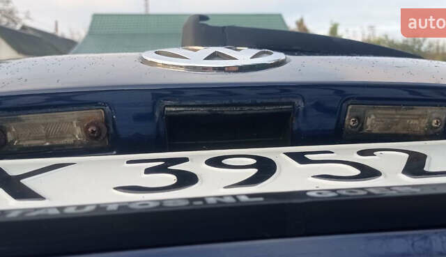 Синий Фольксваген Туран, объемом двигателя 1.4 л и пробегом 237 тыс. км за 6000 $, фото 36 на Automoto.ua