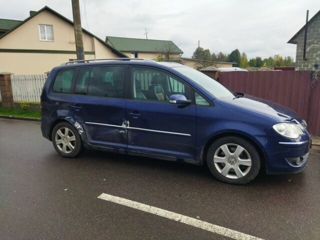 Синий Фольксваген Туран, объемом двигателя 2 л и пробегом 244 тыс. км за 5350 $, фото 2 на Automoto.ua