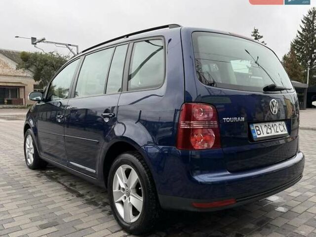 Синий Фольксваген Туран, объемом двигателя 1.4 л и пробегом 203 тыс. км за 6700 $, фото 2 на Automoto.ua